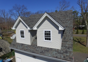 Owens Corning TruDefinition Duration Roofing System with Storm Cloud Designer Shingles by Duane Mainardi Builders, LLC.
